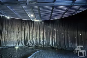 PVC liner protecting the interior of a round water tank